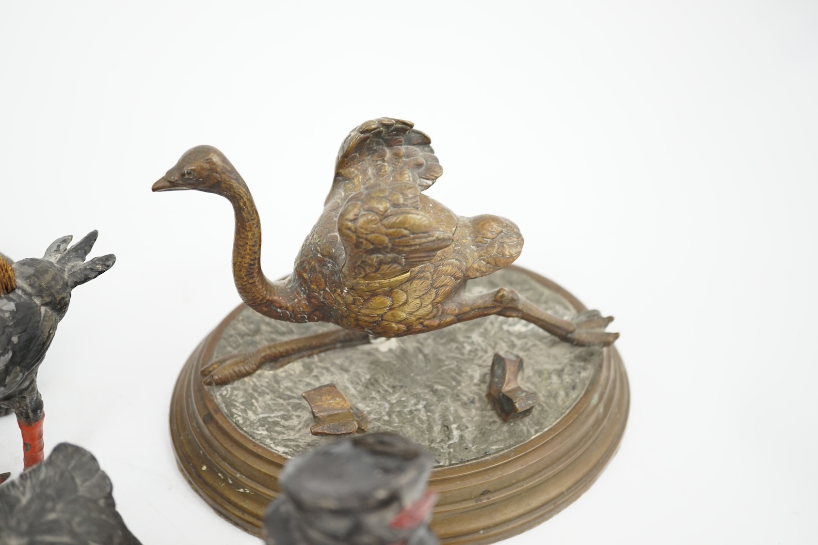 A collection of nine 19th and 20th century novelty animal bronze and metal ink wells, including a Martin Brothers-style ‘Wally’ inkwell. Condition - minor chips due to use and age